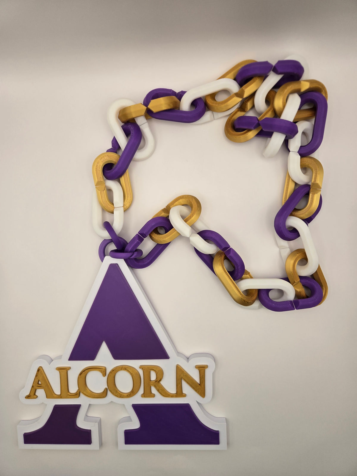 Alcorn Hype Chain – Purple, Gold & White 3D Printed Game Day Chain