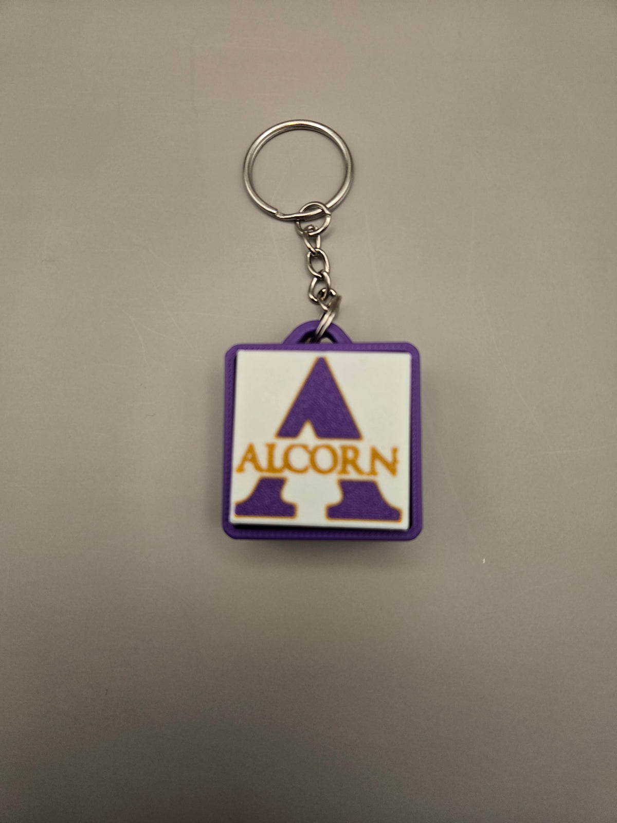 Alcorn Clicker Keychain – Purple, Gold & White 3D Printed Fidget Keychain